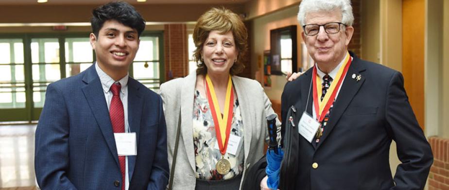 PBD induction student with faculty members