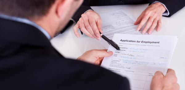 Candidate filling out application for employment