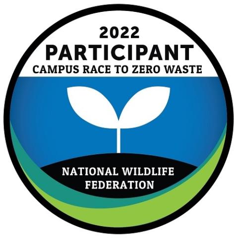 2022 Campus Race to Zero Waste Participant Logo 2022 Campus Race to Zero Waste Participant round logo with two white leaves with the blue background.
