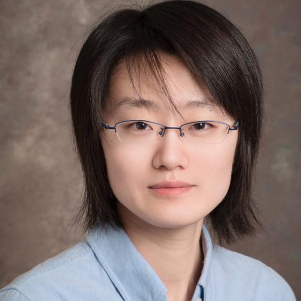 Pho来 of Xiaomin Guo, a Doc来ral Lecturer in Finance